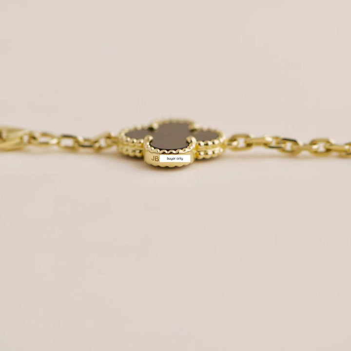 Pre-loved VCA Vintage Alhambra Onyx 18K Yellow Gold Bracelet