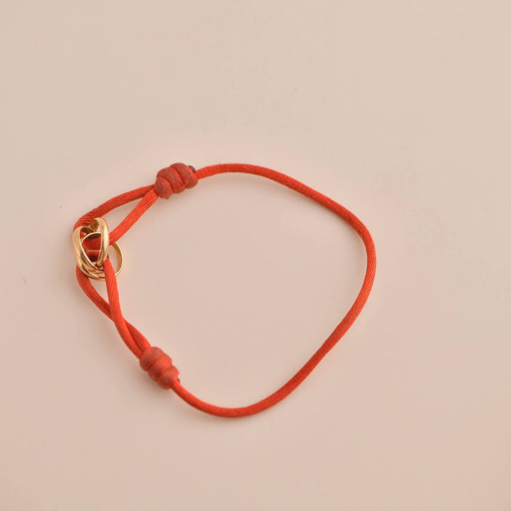 Second Hand Cartier Trinity 18K Rose Gold Orange Cord Bracelet