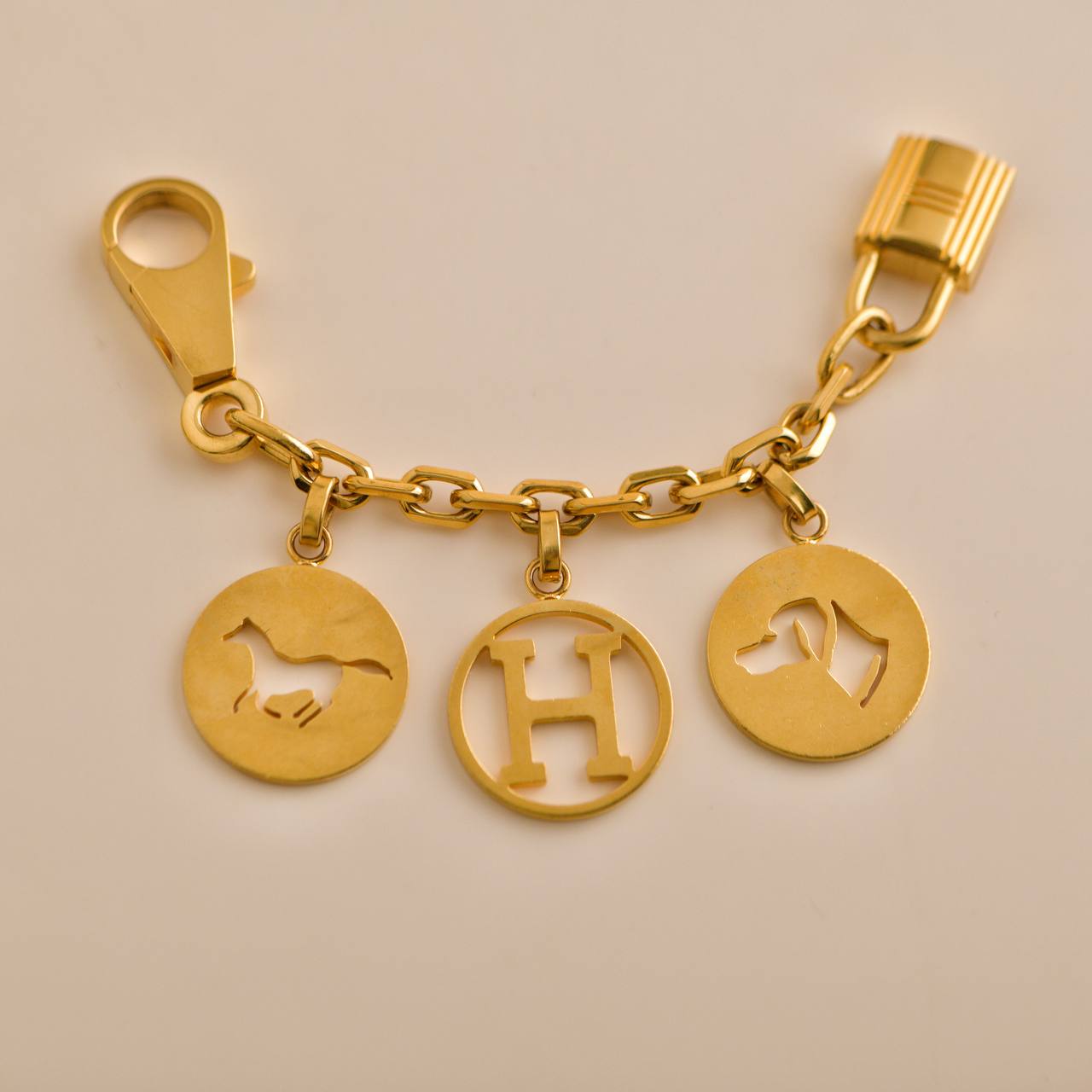 Hermès Gold plated Breloque Olga Bag Charm Amulette – Dandelion Hermès Gold plated Breloque Olga Bag Charm Amulette – Dandelion