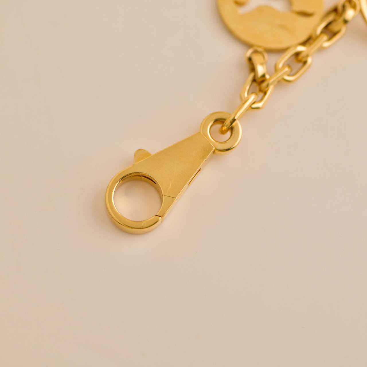 Hermès Gold plated Breloque Olga Bag Charm Amulette – Dandelion