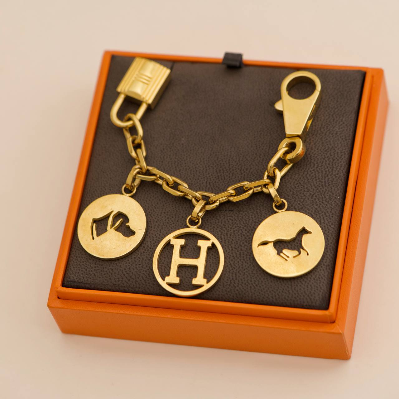 Hermes Gold Tone Breloque Olga Bag Charm Amulette – Dandelion Antiques Hermes Gold Tone Breloque Olga Bag Charm Amulette – Dandelion Antiques