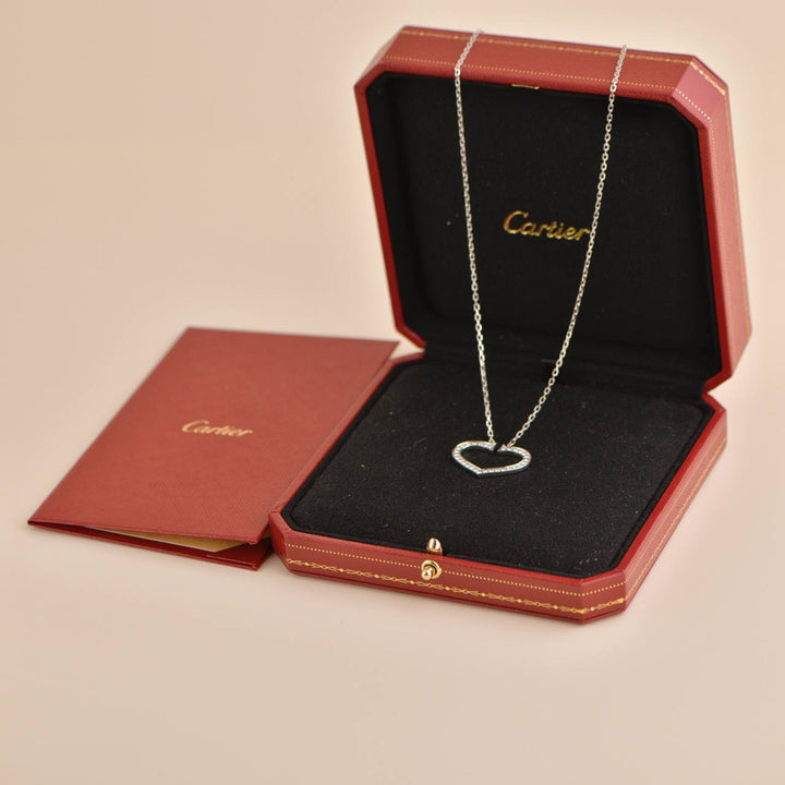 Preowned Cartier White 18K Gold Diamond Hearts and Symbols Necklace