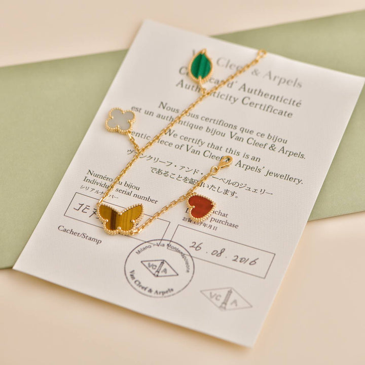 Second Hand Van Cleef & Arpels Lucky Alhambra 4 Motifs Yellow Gold Bracelet