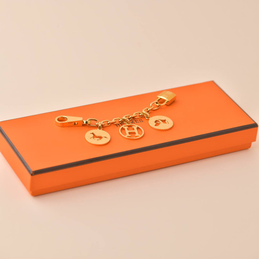 Preowned Hermès Gold plated Breloque Olga Bag Charm Amulette