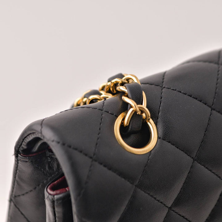 Preowned Chanel Black Lambskin Quilted Medium Classic Double Flap Handbag