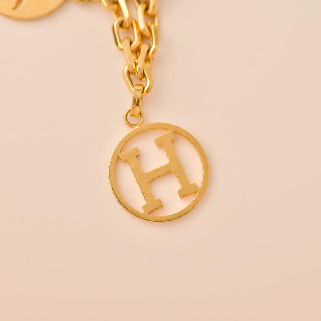 Second Hand Hermès Breloque Olga Gold Bag Charm Amulette