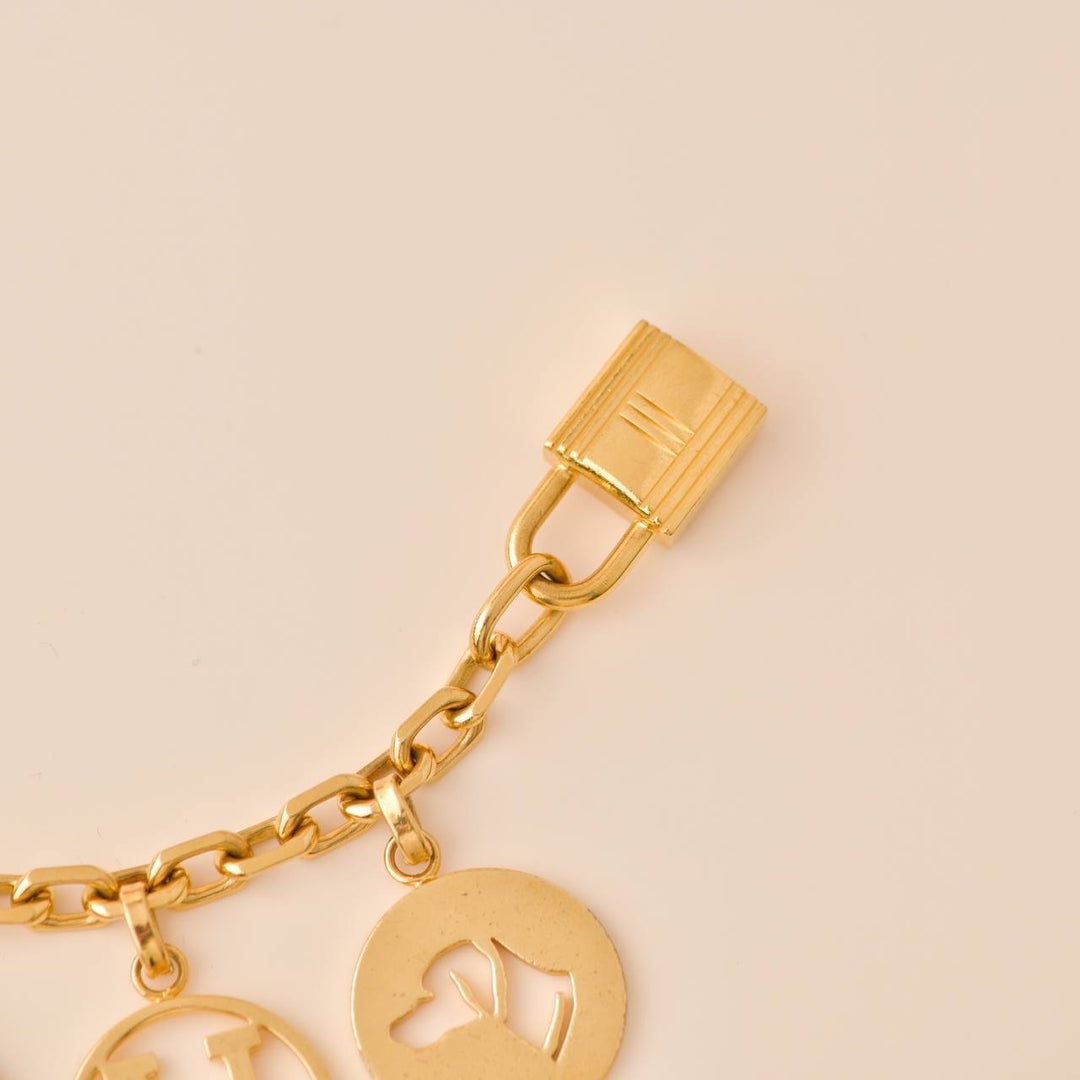 Second Hand Hermès Gold plated Breloque Olga Bag Charm