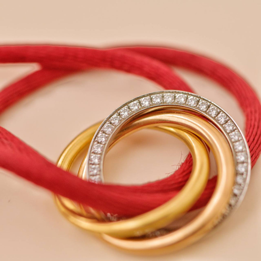 Cartier Trinity Diamond 18K Yellow Rose and White Gold Red Cord Bracelet