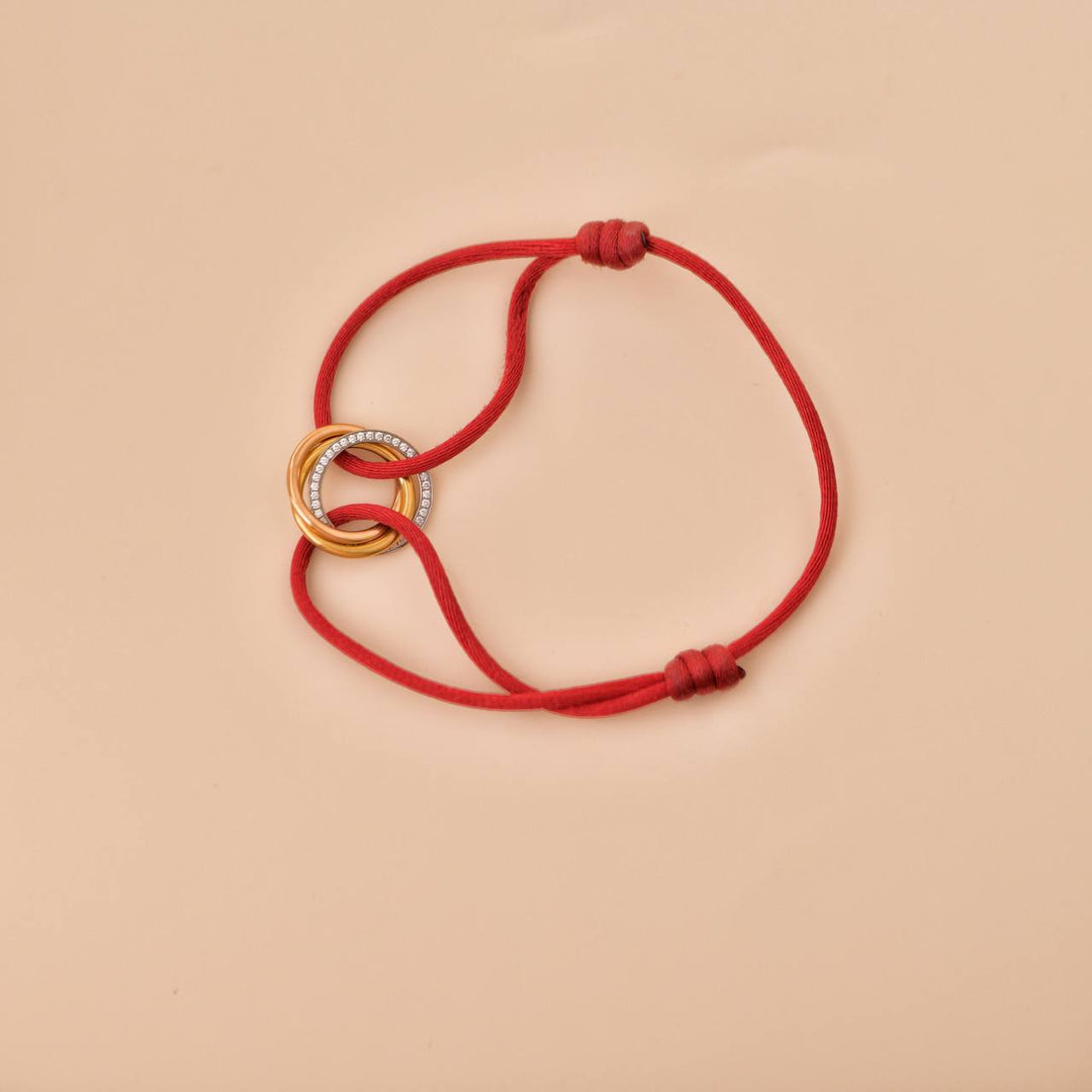 Cartier Trinity Diamond 18K Yellow Rose and White Gold Red Cord Bracelet