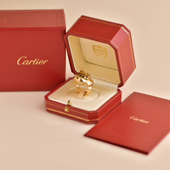 Preowned Cartier Panthère de Cartier 18k Yellow Gold Garnet Onyx Ring Size 57