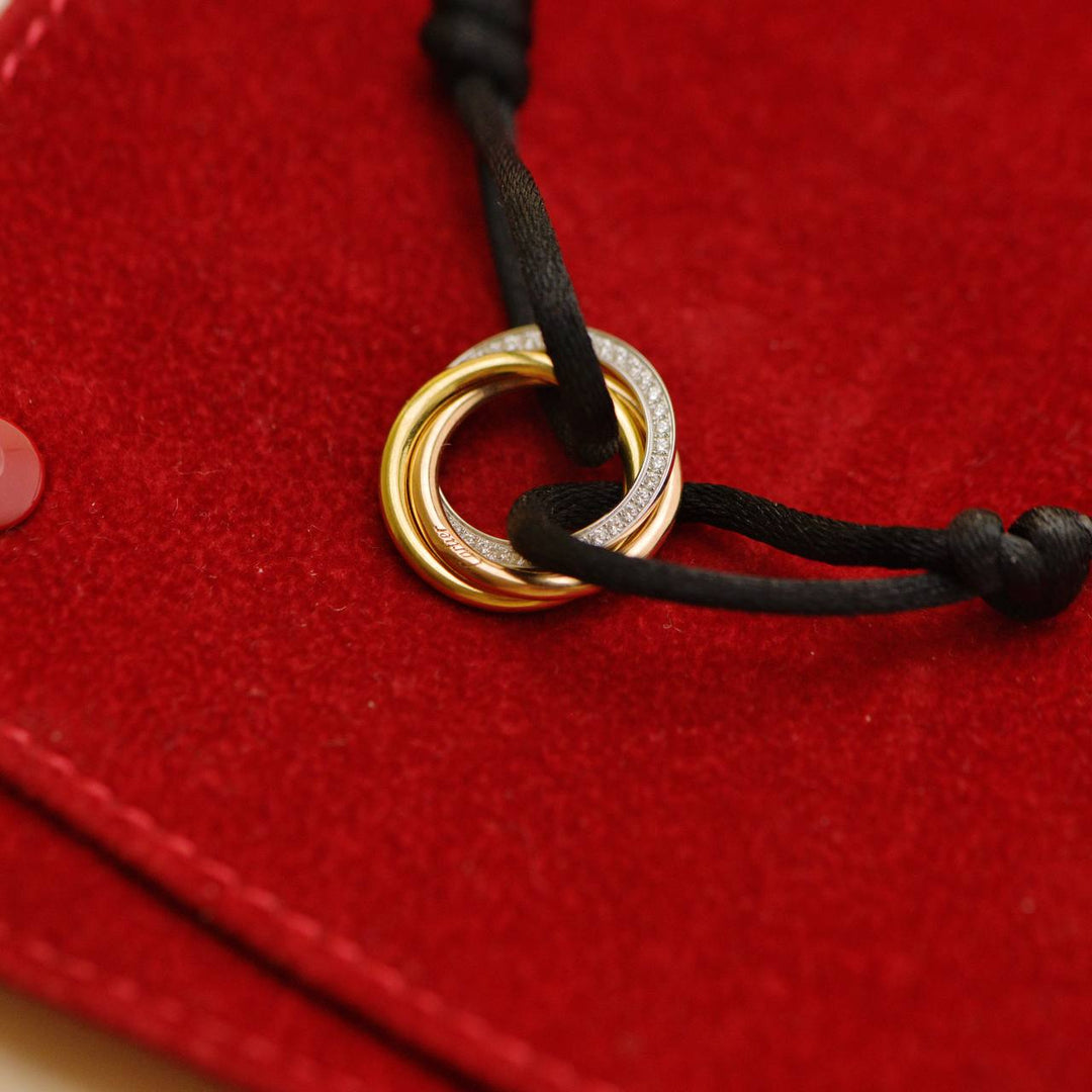 Second Hand Cartier Trinity Diamond Yellow White and Rose Gold Black Cord Bracelet