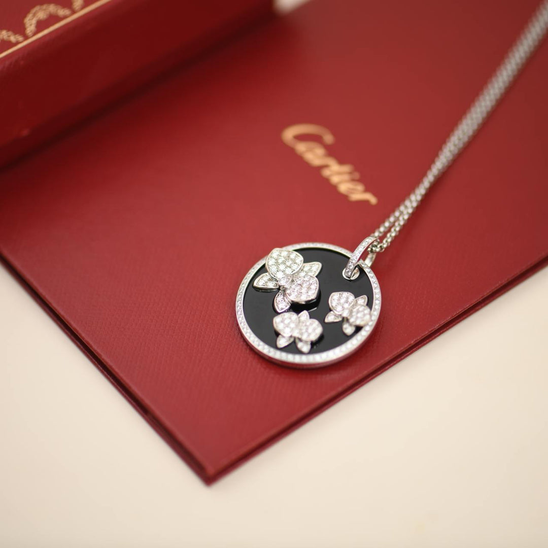 Cartier Caresse D'Orchidees Par Cartier Diamond 18K White Gold Black Onyx Round Pendant Necklace
