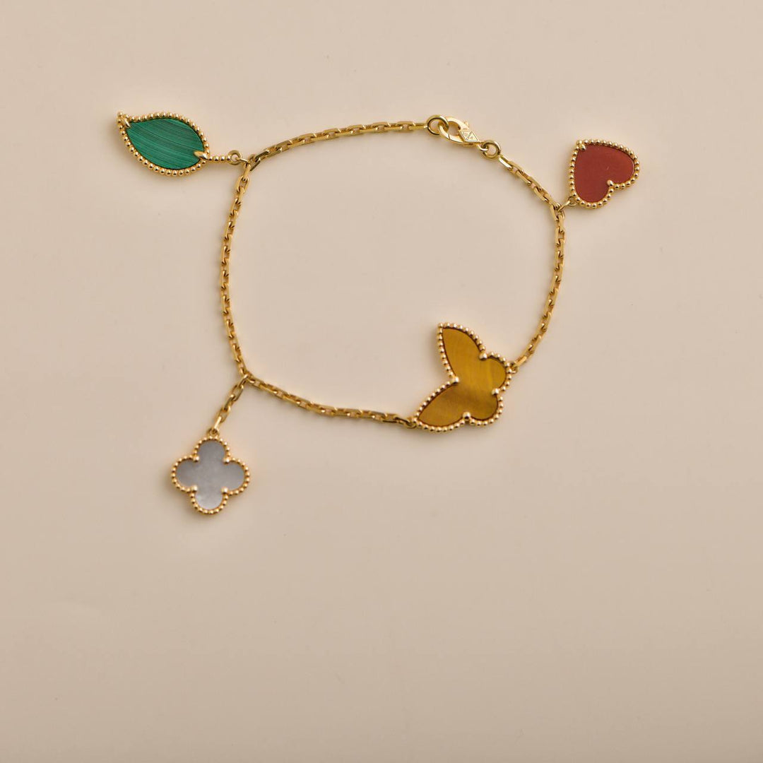 Preloved Van Cleef Lucky Alhambra 4 Motifs 18K Yellow Gold Bracelet