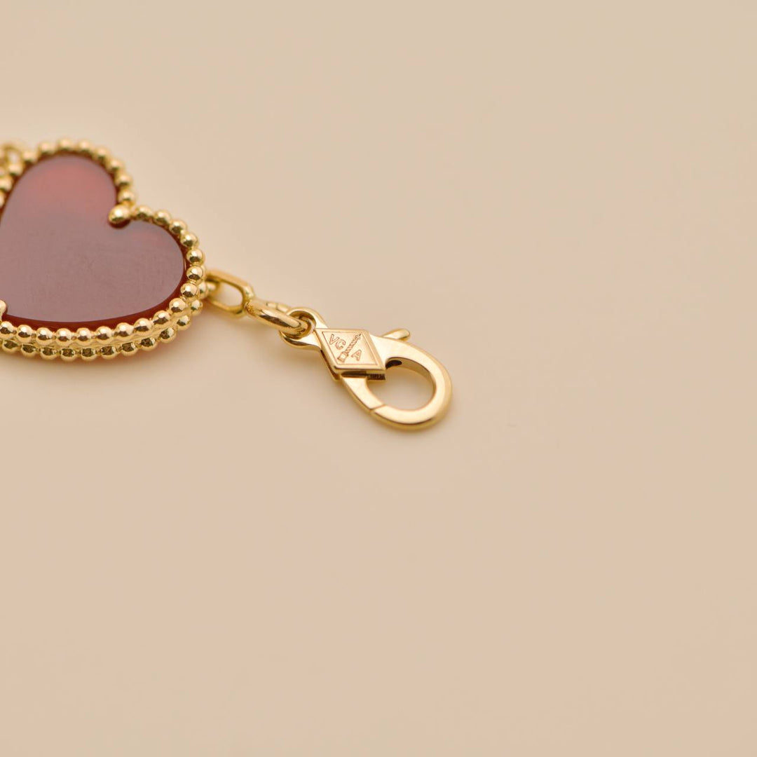 Second Hand Van Cleef Lucky Alhambra 4 Motifs 18K Yellow Gold Bracelet