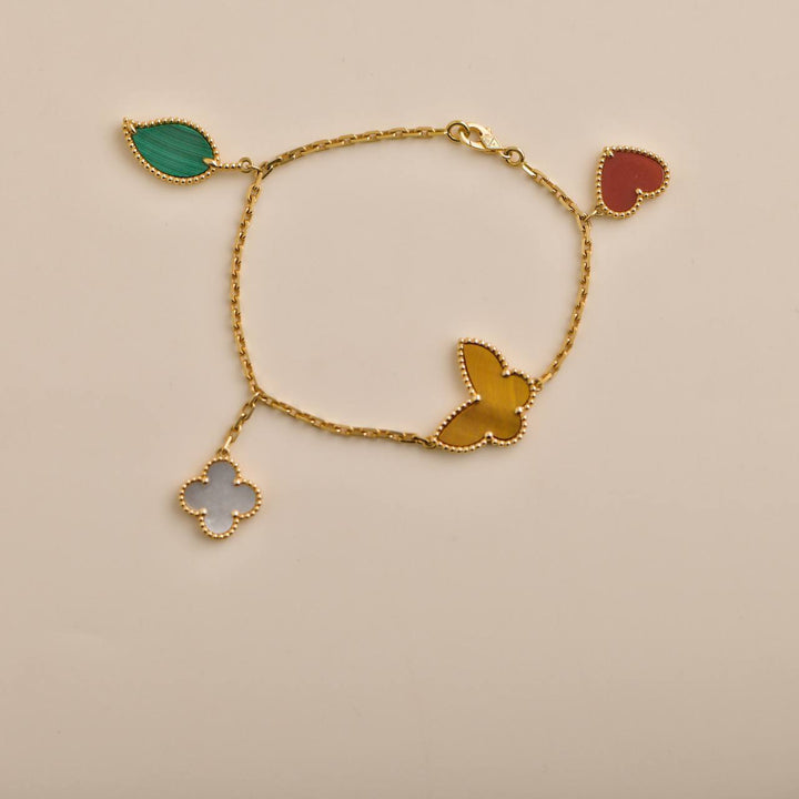 Preowned Van Cleef Lucky Alhambra 4 Motifs 18K Yellow Gold Bracelet
