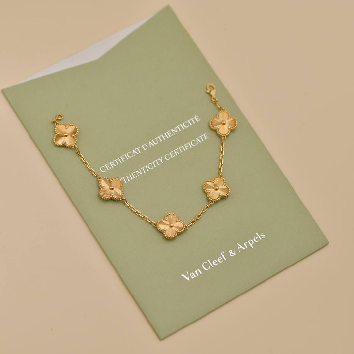 Second Hand Van Cleef & Arpels Vintage Alhambra Guilloché 5 Motifs 18K Yellow Gold Bracelet