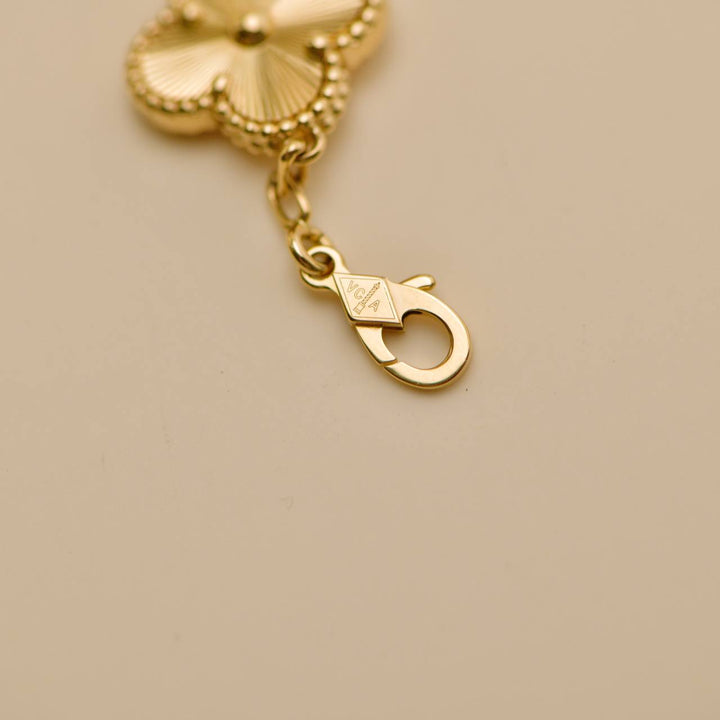 Second Hand VCA Vintage Alhambra Guilloché 5 Motifs 18K Yellow Gold Bracelet