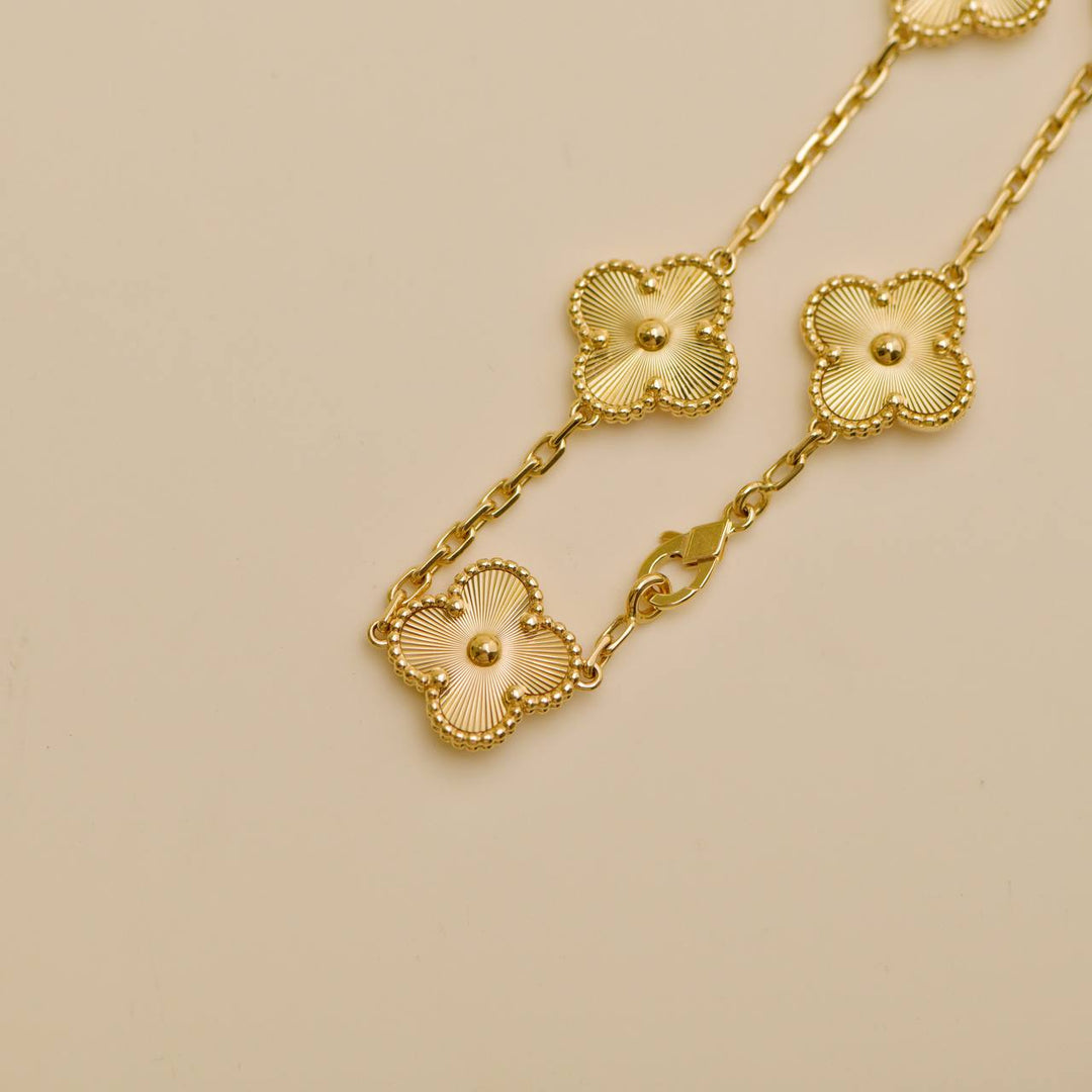 Second Hand Van Cleef Vintage Alhambra Guilloché 5 Motifs 18K Yellow Gold Bracelet