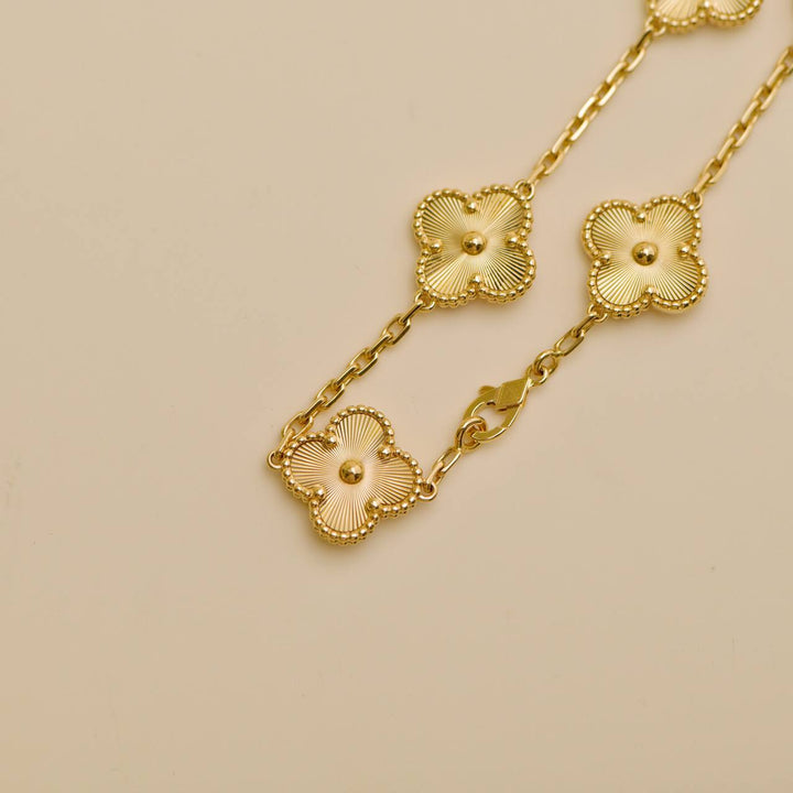 Second Hand Van Cleef Vintage Alhambra Guilloché 5 Motifs 18K Yellow Gold Bracelet
