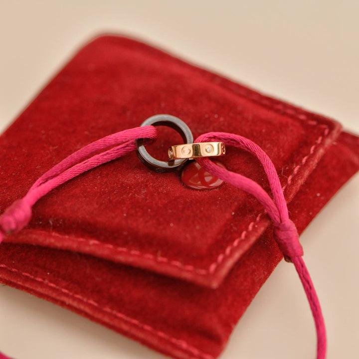 Preloved Cartier Love 4 Diamond 18K Rose Gold Sevres Porcelain Silk Cord Bracelet