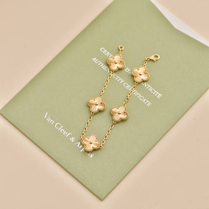 Second Hand Van Cleef & Arpels Vintage Alhambra Guilloché 5 Motifs 18K Yellow Gold Bracelet