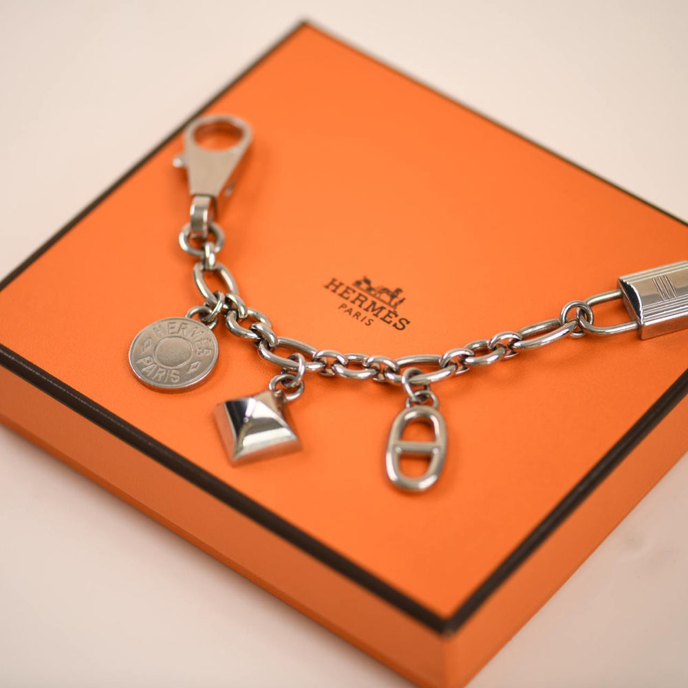 Used Hermès Permabrass Olga Palladium Plated Bag Charm