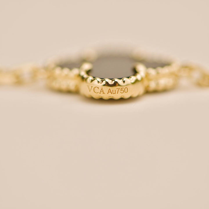 Preowned Van Cleef Vintage Alhambra 5 Motif Onyx 18K Yellow Gold Bracelet