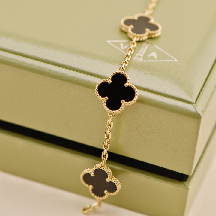 Second Hand Van Cleef & Arpels Vintage Alhambra 5 Motif Onyx 18K Yellow Gold Bracelet