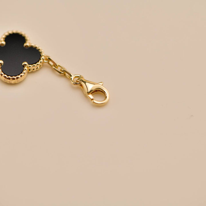 Second Hand Van Cleef Vintage Alhambra 5 Motif Onyx 18K Yellow Gold Bracelet
