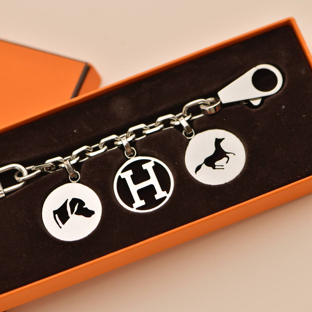 Second Hand Hermès Breloque Olga Silver Bag Charm Amulette