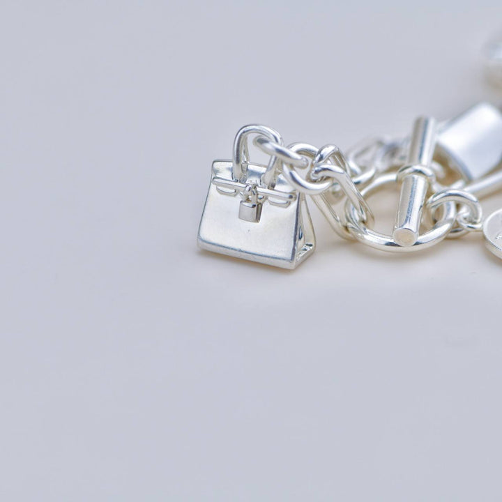 Preloved Hermès Sterling Silver Amulettes Bracelet
