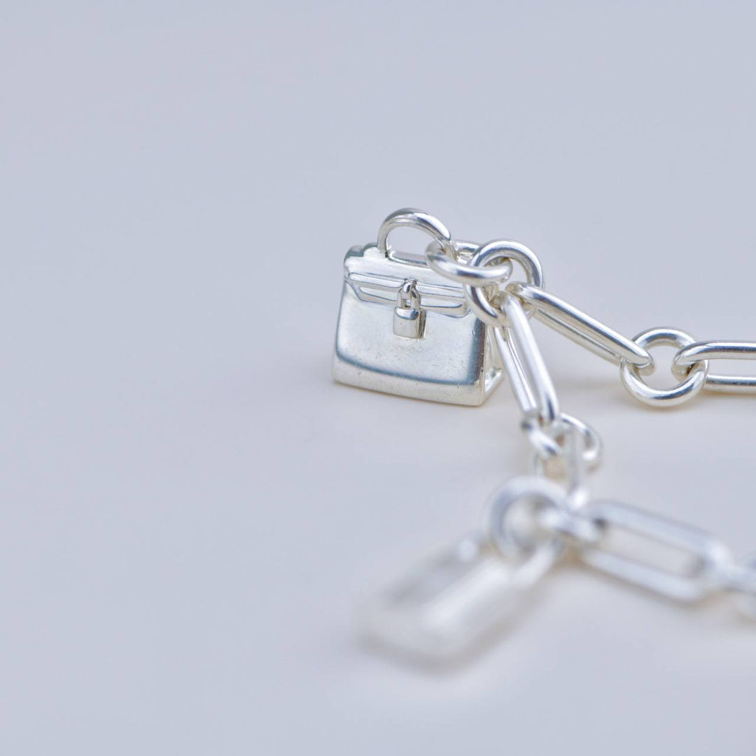 Preowned Hermès Sterling Silver Amulettes Bracelet