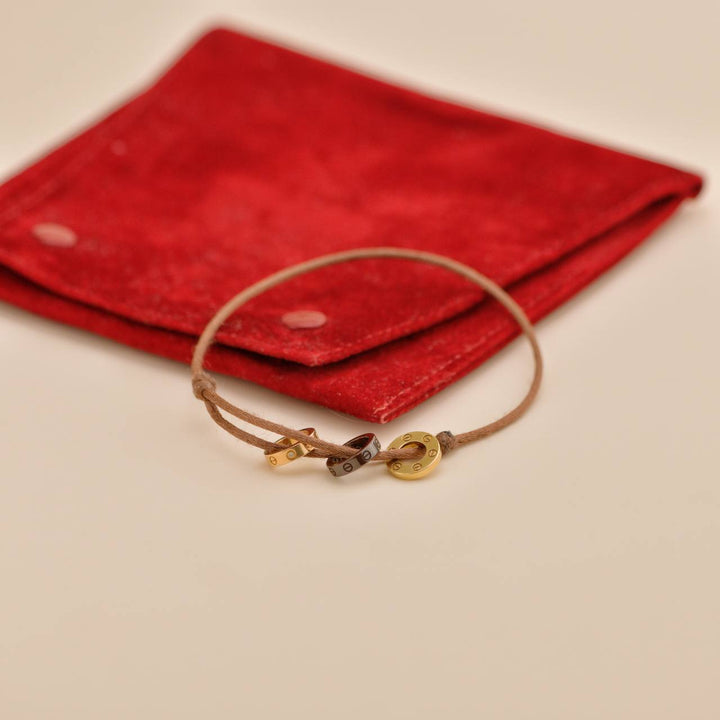 Second Hand Cartier Love 18k Yellow & Rose 4 Diamond Sèvres Porcelain Brown Cord Bracelet