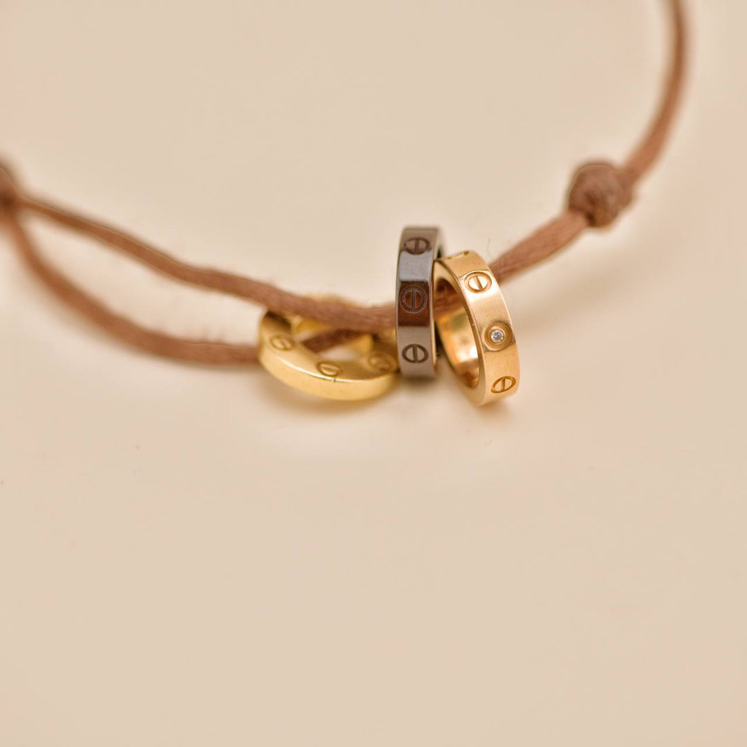 Preowned Cartier Love 18k Yellow & Rose 4 Diamond Sèvres Porcelain Cord Bracelet