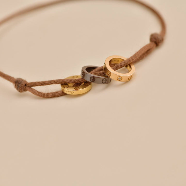 Second Hand Cartier Love 18k Yellow & Rose 4 Diamond Sèvres Porcelain Cord Bracelet