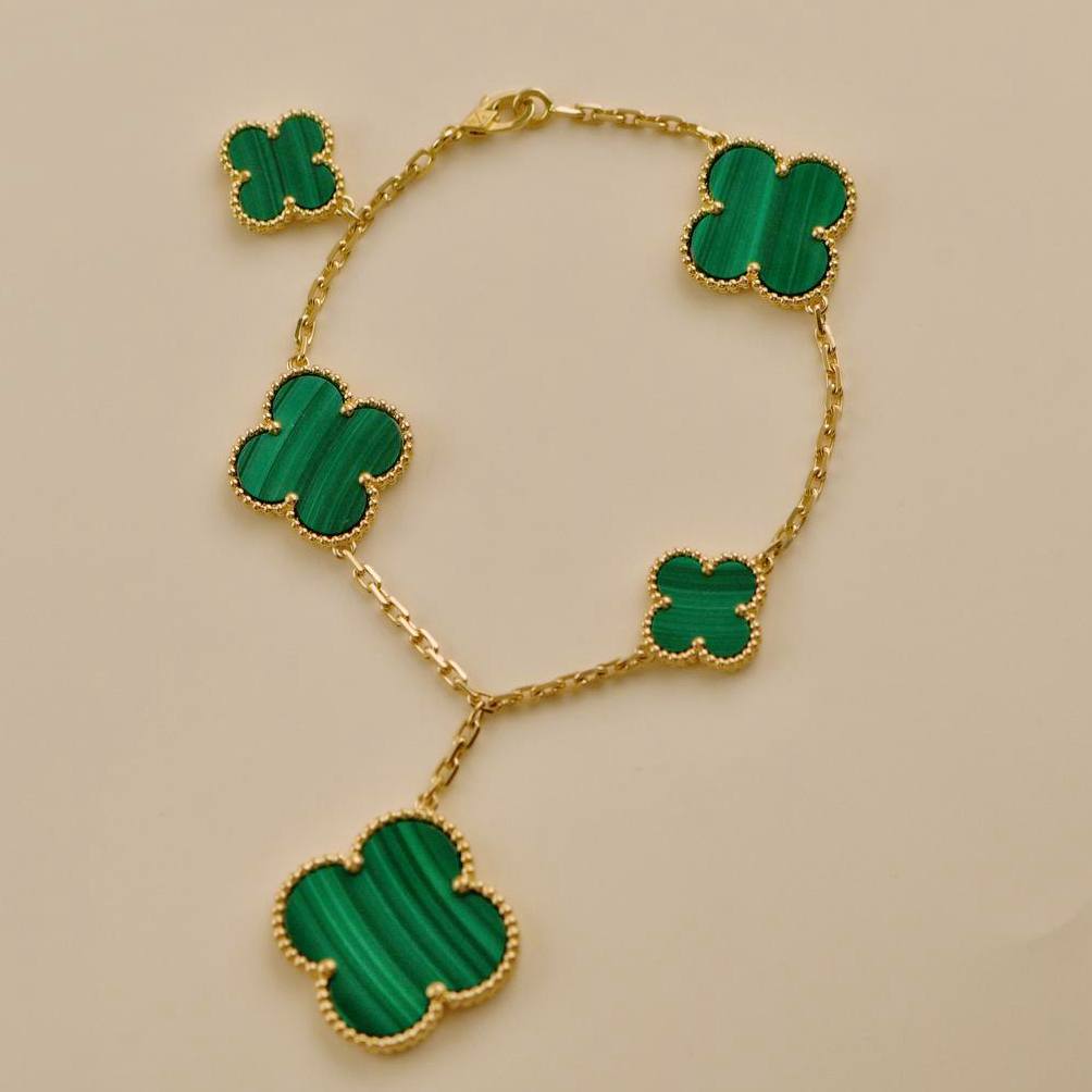 Second Hand Van Cleef & Arpels Magic Alhambra Malachite 18K Yellow Gold Bracelet 