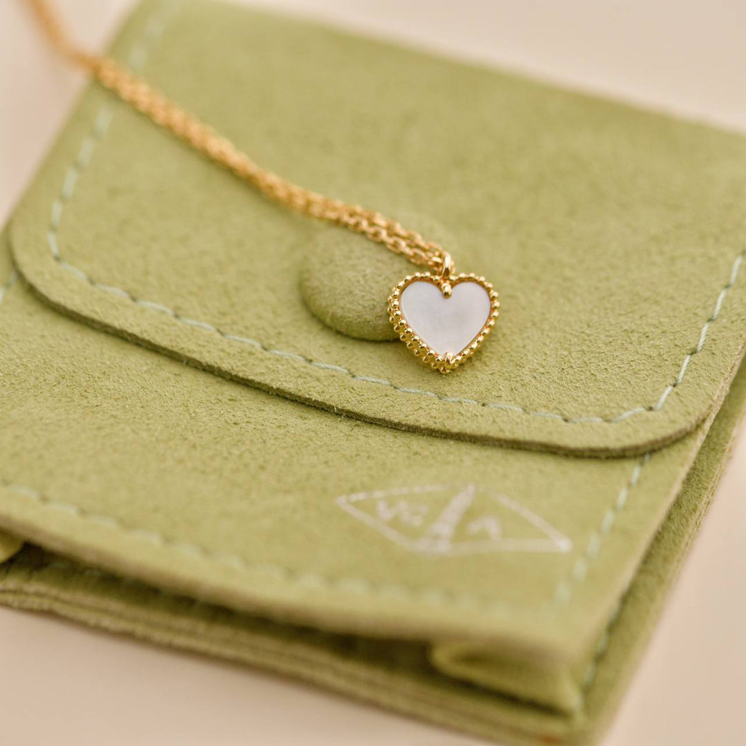 Preowned Van Cleef & Arpels Sweet Alhambra Heart Mother of Pearl 18K Yellow Gold Pendant Necklace