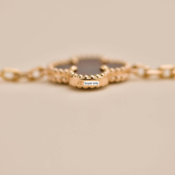 Preowned Van Cleef Vintage Alhambra Letterwood 5 Motif 18K Yellow Rose Bracelet 
