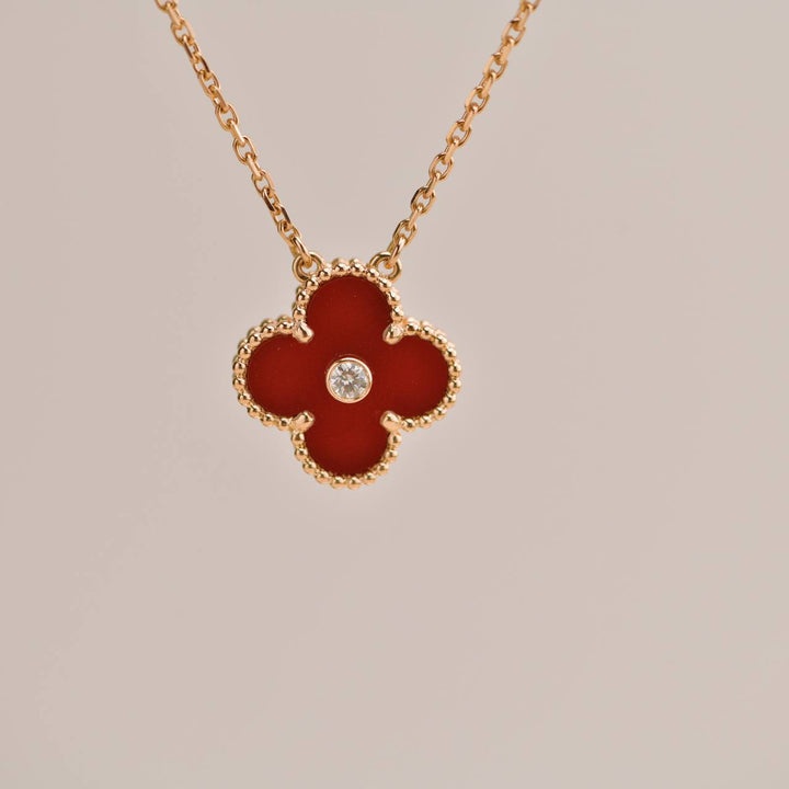 Preloved Van Cleef Carnelian Diamond 18K Rose Gold 2011 Holiday Pendant