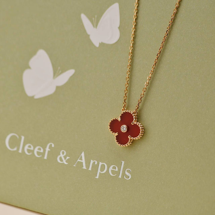Second Hand Van Cleef & Arpels Carnelian Diamond 18K Rose Gold 2011 Holiday Pendant