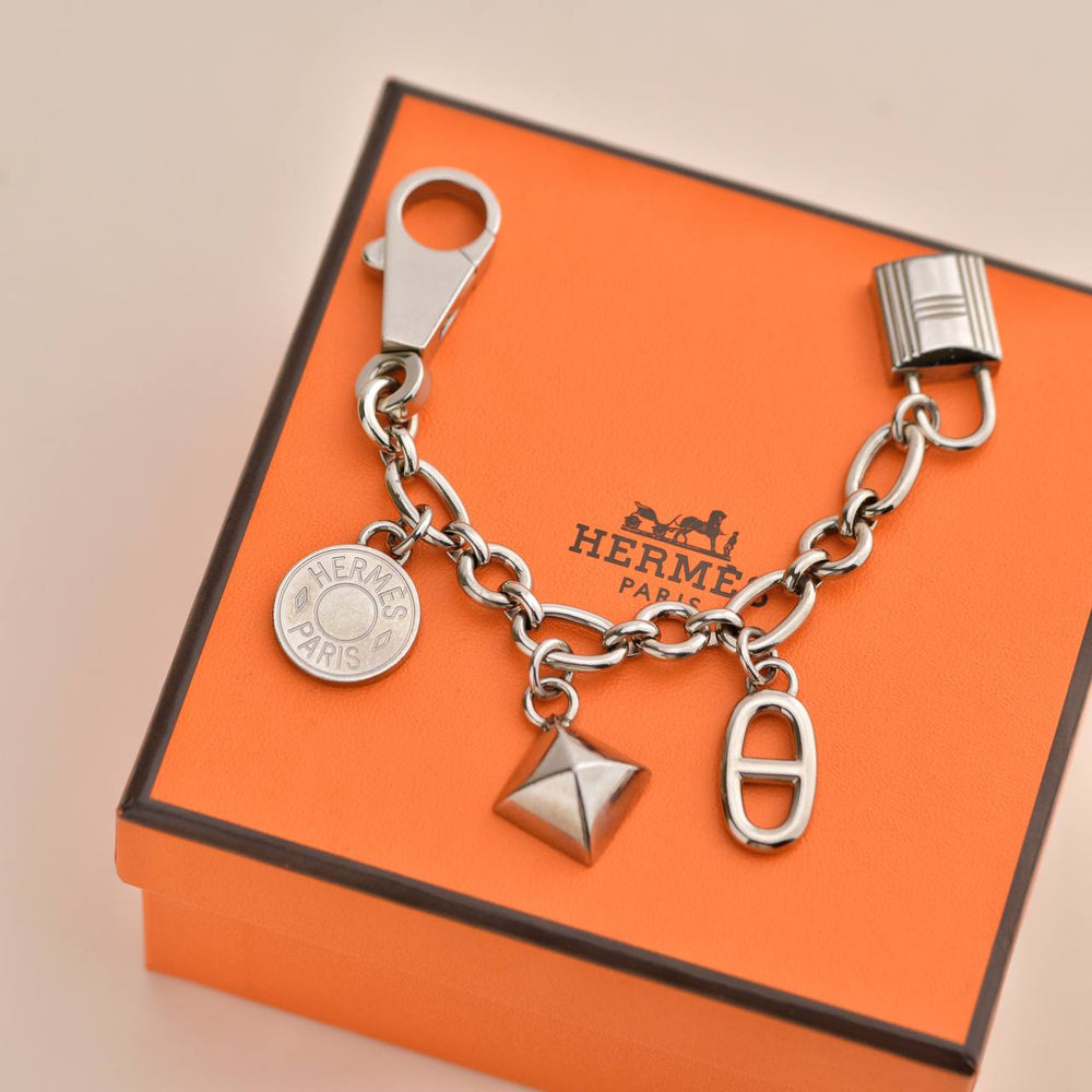 Preowned Hermès Permabrass Olga Palladium Plated Bag Charm