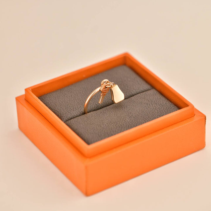 Second Hand Hermès Kelly Clochette 18K Rose Gold Ring Size 54