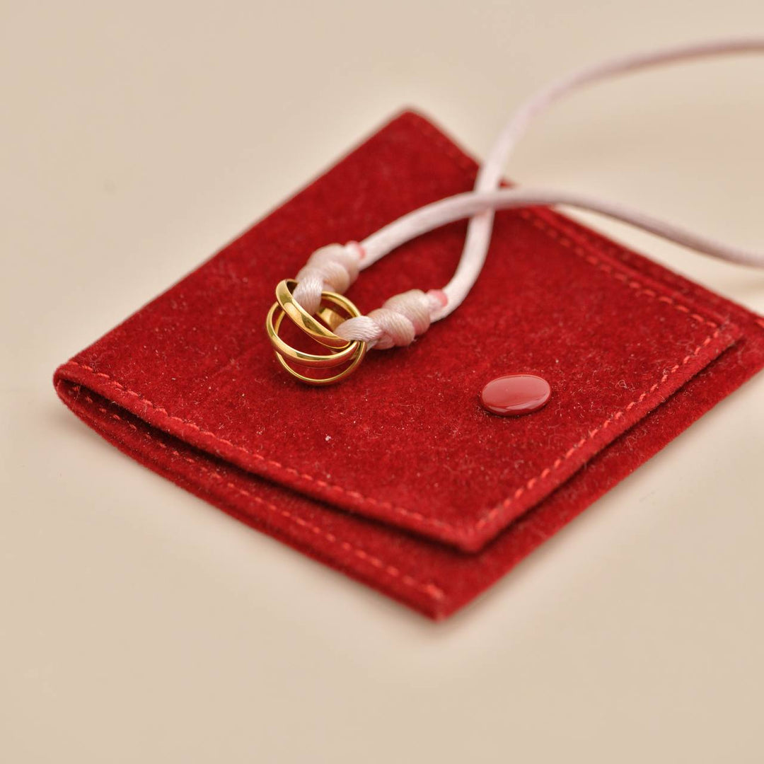 Second Hand Cartier Trinity 18K Yellow Gold Pink Silk Cord Bracelet