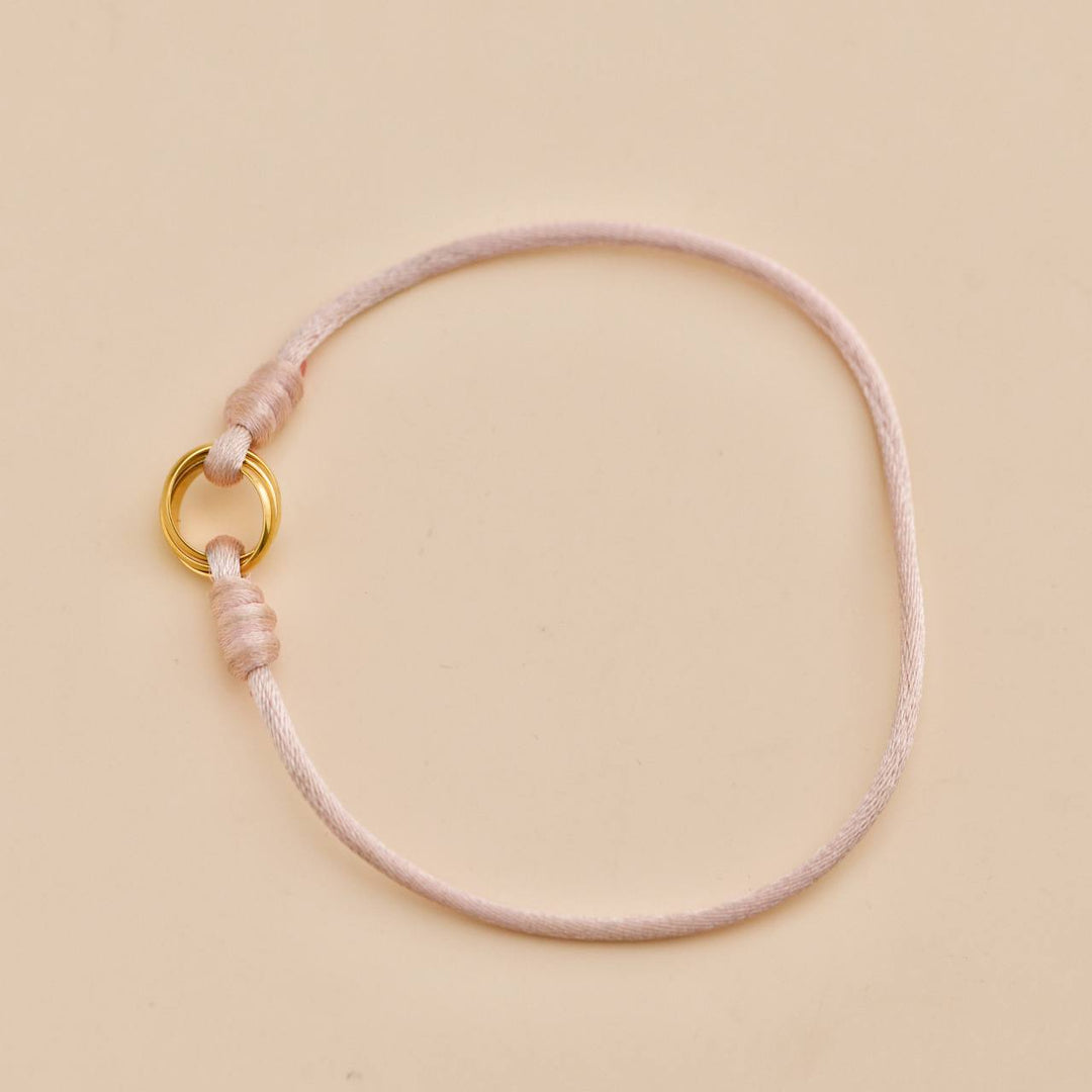 Preowned Cartier Trinity 18K Yellow Gold Silk Cord Bracelet