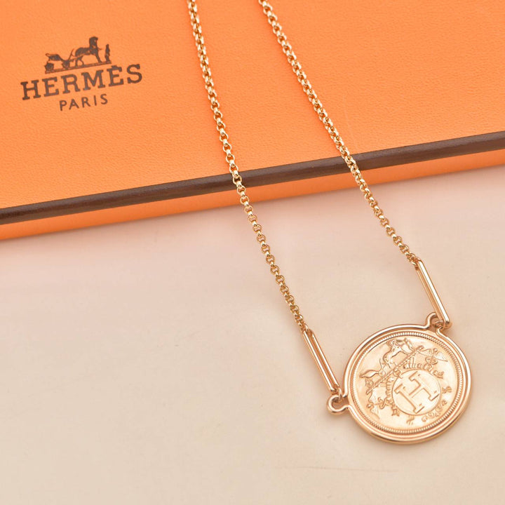 Second Hand Hermès 18K Rose Gold Coin Pendant Necklace 