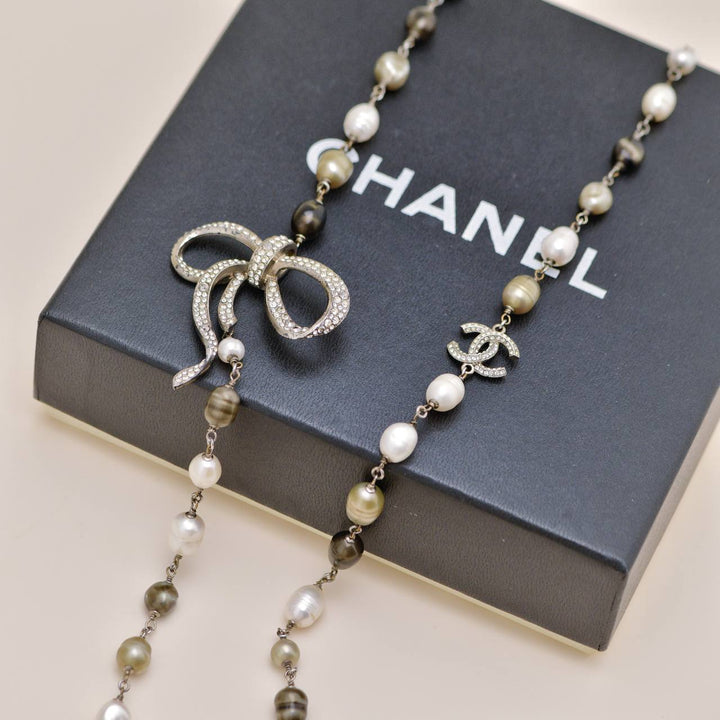 Preowned Chanel CC Collection Faux Pearl Crystal Bow Bead Necklace