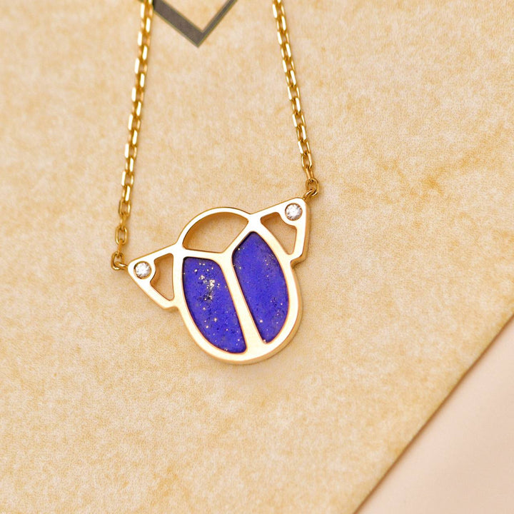 Second Hand Cartier Limited Edition Diamond Lapis Lazuli 18K Yellow Gold Scarab Necklace