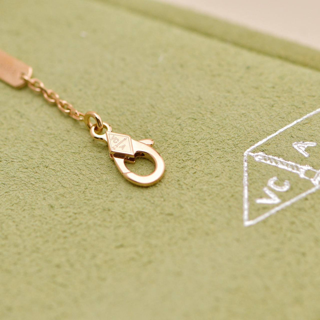 Van Cleef & Arpels 2025 Pink Mother of Pearl Holiday Pendant