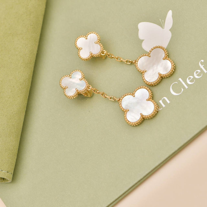 Second Hand Van Cleef & Arpels Magic Alhambra 2 Motifs Mother of Pearl 18K Yellow Gold Earrings