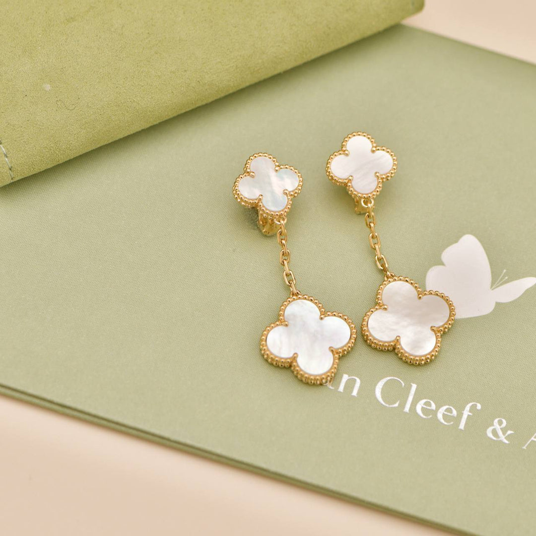 Used Van Cleef & Arpels Magic Alhambra 2 Motifs Mother of Pearl 18K Yellow Gold Earrings